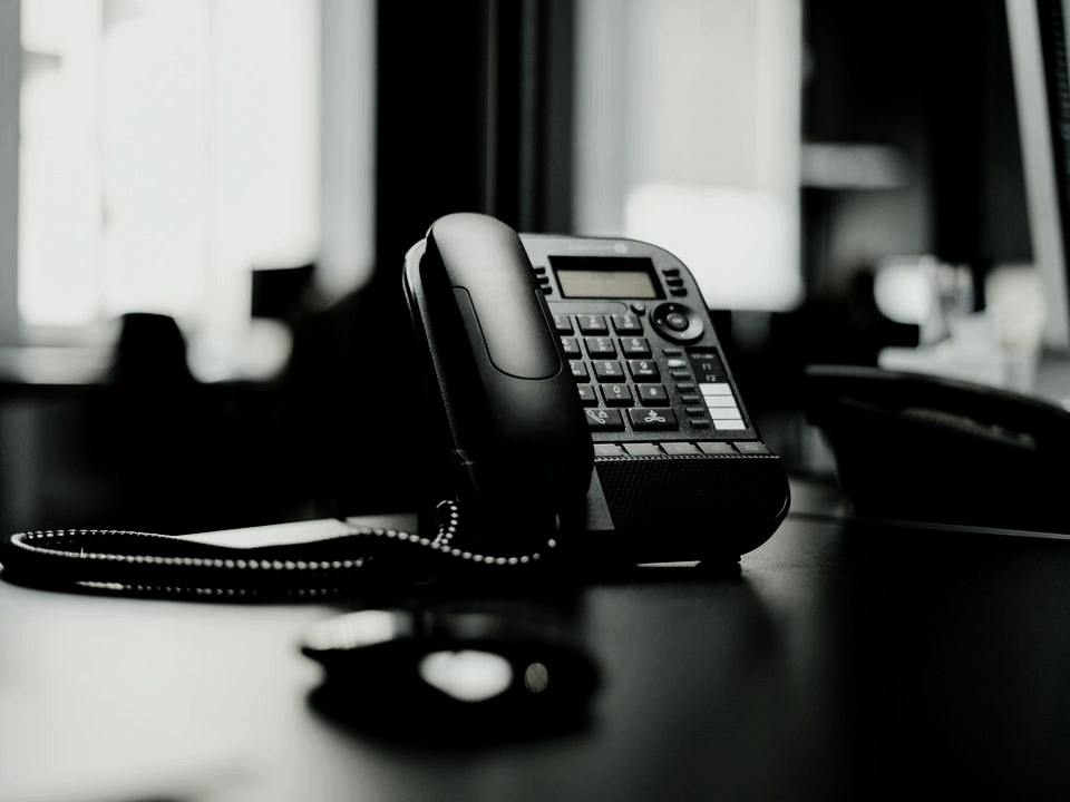 Business desk phone on an office desk
